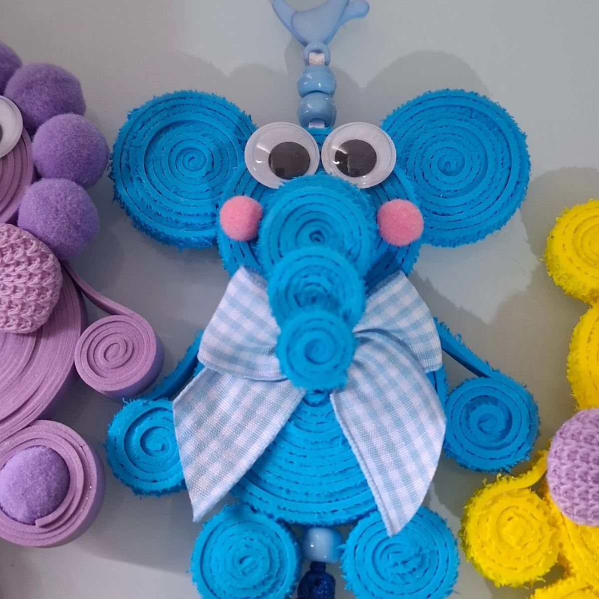 Bichinhos em espiral com pompom, foto 3